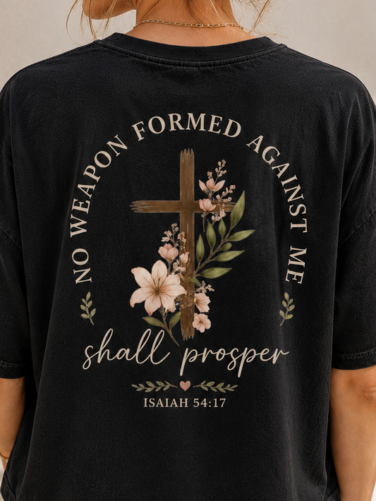 Women's Boxy Tee — "No Weapon Formed Against Me Shall Prosper" Floral Cross Christian Tee